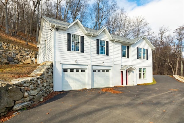 view of front of house featuring a garage and driveway