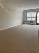 empty room featuring baseboards