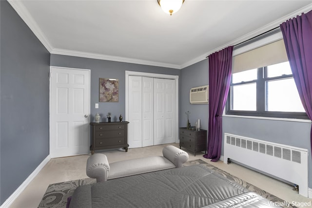 carpeted bedroom featuring baseboards, radiator heating unit, ornamental molding, an AC wall unit, and a closet