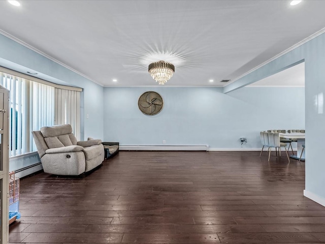 unfurnished room featuring a baseboard heating unit, visible vents, baseboard heating, and hardwood / wood-style flooring