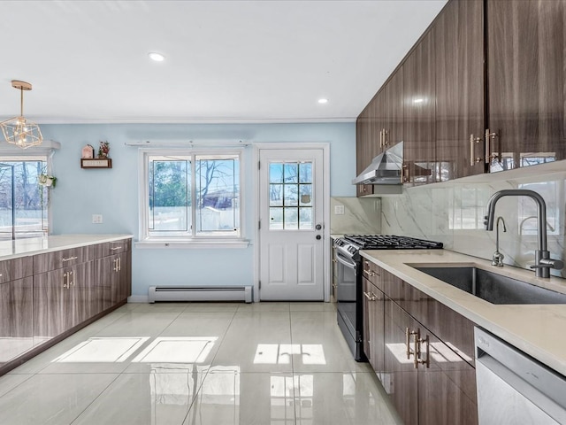 kitchen with dishwashing machine, under cabinet range hood, a baseboard heating unit, a sink, and black gas stove