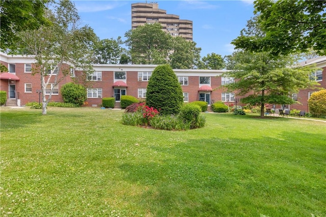 surrounding community featuring a yard