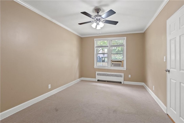 unfurnished room with radiator heating unit, carpet, baseboards, and ornamental molding