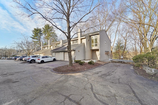 view of home's exterior featuring a chimney