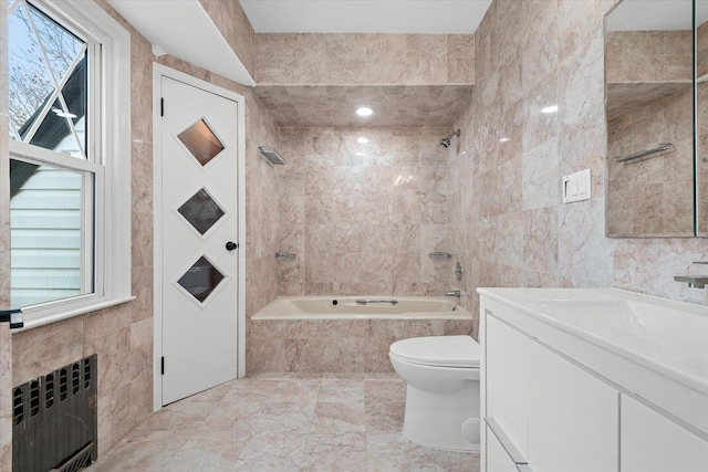 53-31 212th St, Bayside, NY 11364 - bathroom with radiator heating unit, tile walls, toilet, marble tiled flooring, and vanity