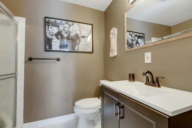 full bathroom with a shower with door, toilet, vanity, tile patterned flooring, and baseboards