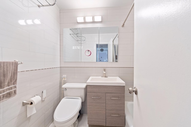 bathroom featuring shower / bath combination, tile walls, toilet, vanity, and backsplash