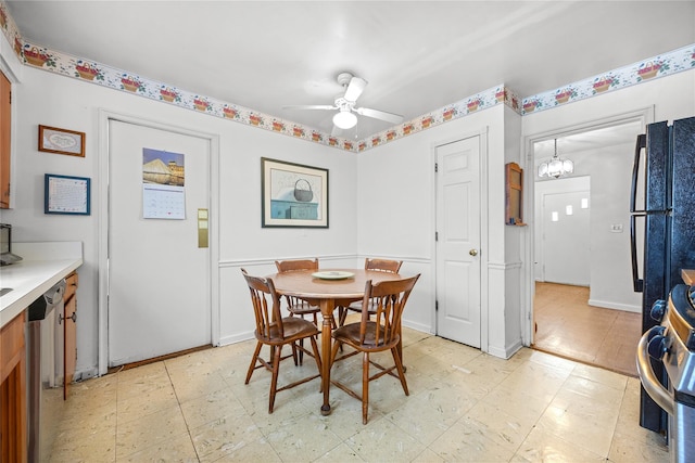 dining space with light floors, baseboards, and a ceiling fan