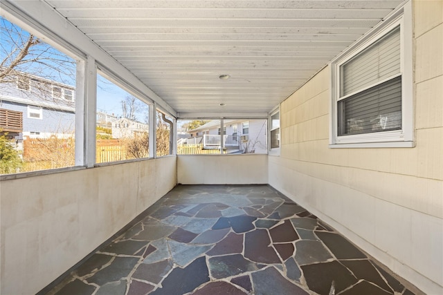 view of unfurnished sunroom