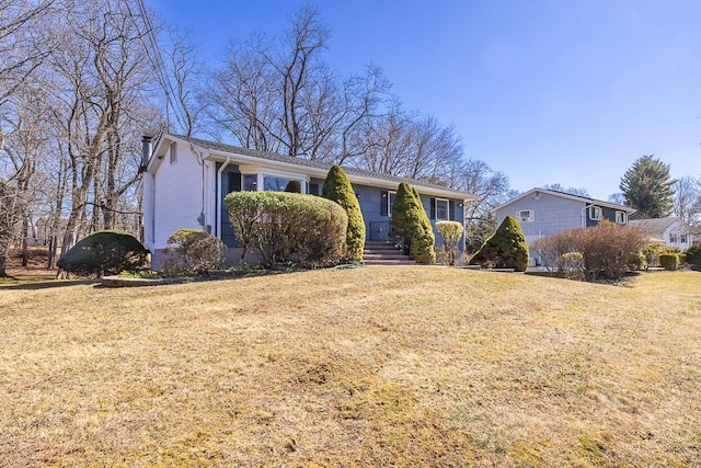 view of front facade with a front lawn