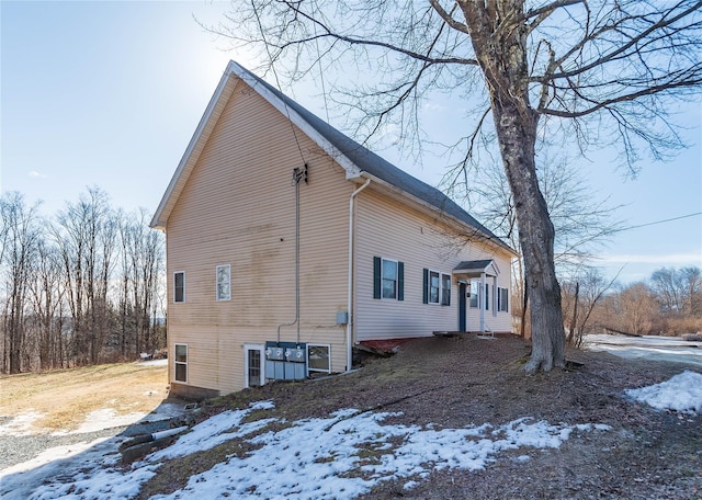 view of snow covered property