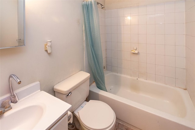 bathroom with vanity, toilet, and shower / bath combo with shower curtain