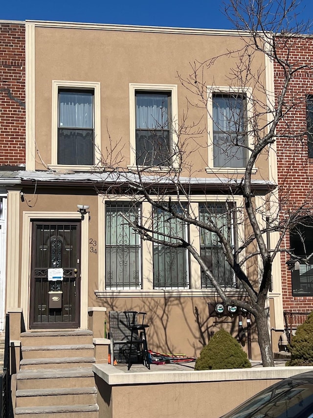 exterior space with stucco siding