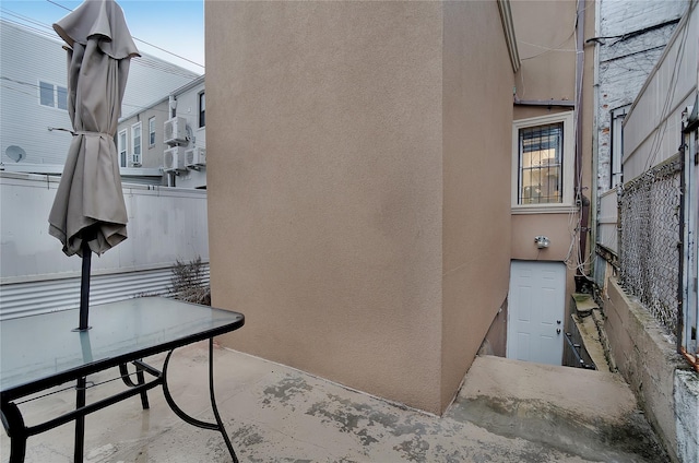 exterior space featuring stucco siding