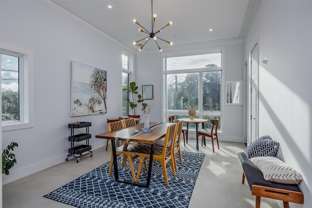 dining area featuring an inviting chandelier, baseboards, crown molding, and recessed lighting