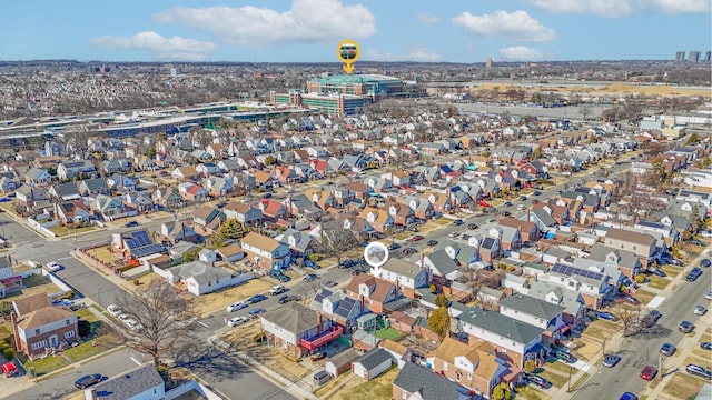 birds eye view of property with a residential view