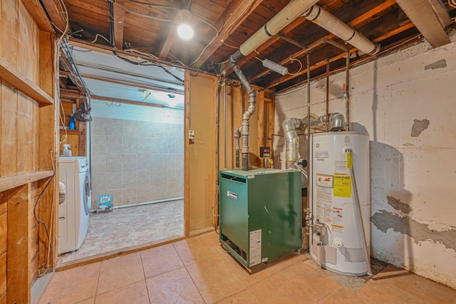 utility room with washer / clothes dryer, a heating unit, and water heater