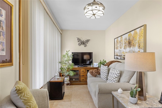 living room with light tile patterned floors