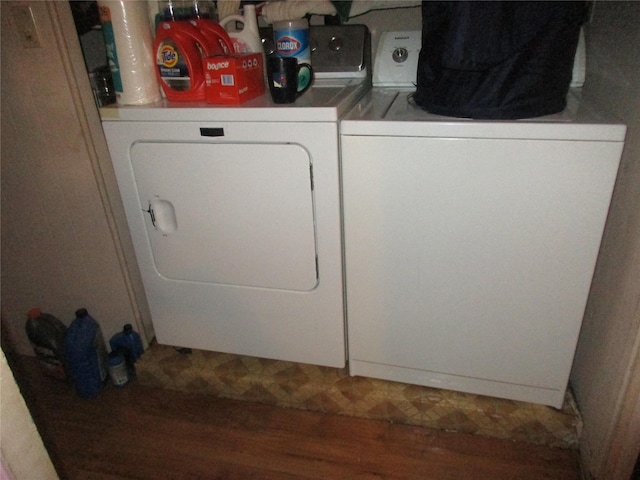 laundry area with laundry area and separate washer and dryer