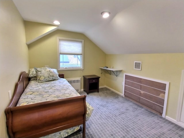 bedroom featuring visible vents, baseboards, lofted ceiling, radiator heating unit, and carpet floors