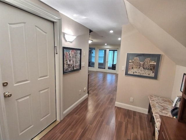 hallway with recessed lighting, dark wood-style flooring, and baseboards