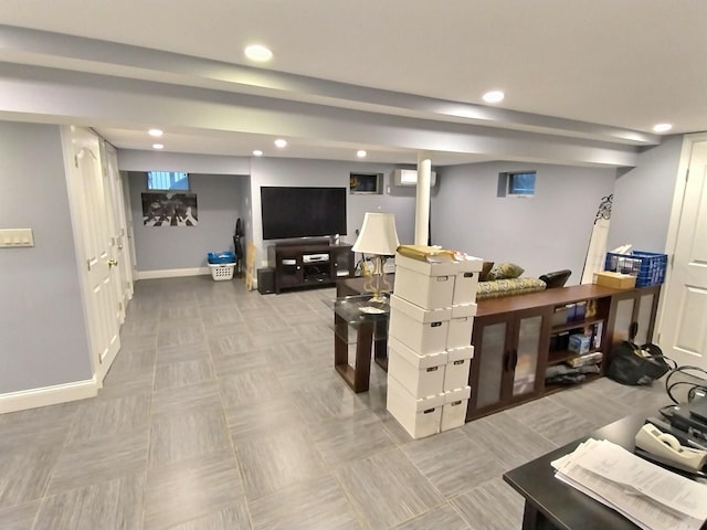 interior space with baseboards and recessed lighting