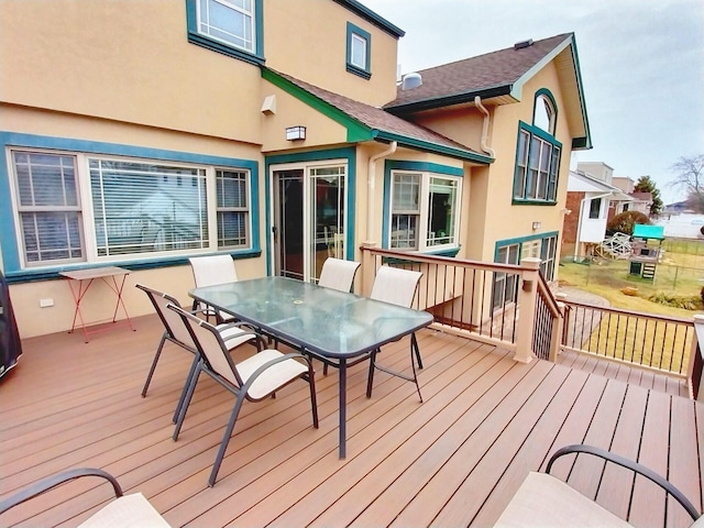 deck featuring outdoor dining space