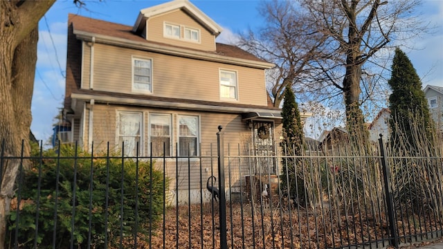 exterior space with a fenced front yard