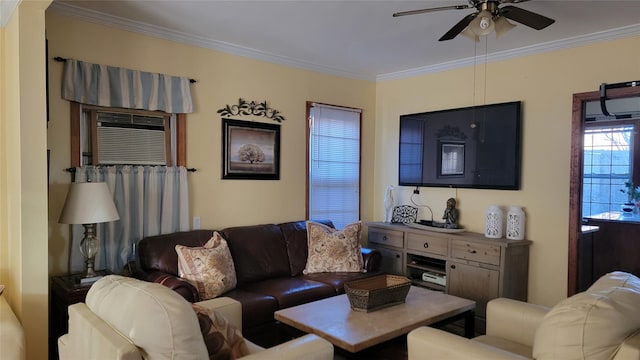 living area with crown molding and ceiling fan