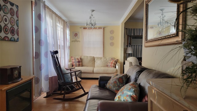 living room featuring crown molding and light wood-style floors