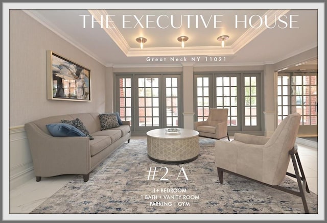 living room with ornamental molding, a tray ceiling, marble finish floor, and plenty of natural light