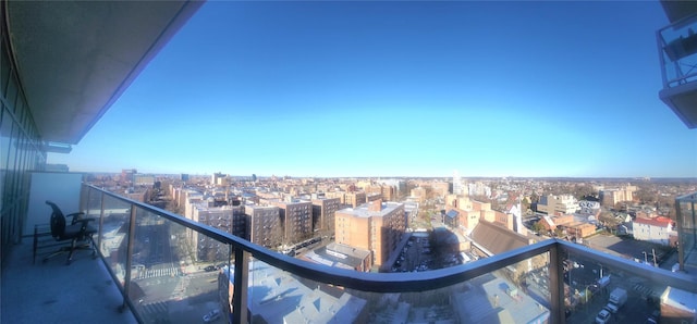 balcony featuring a city view