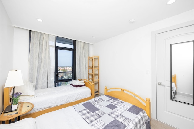 41-62 Bowne St Unit 12G, Flushing, NY 11355 - bedroom featuring recessed lighting