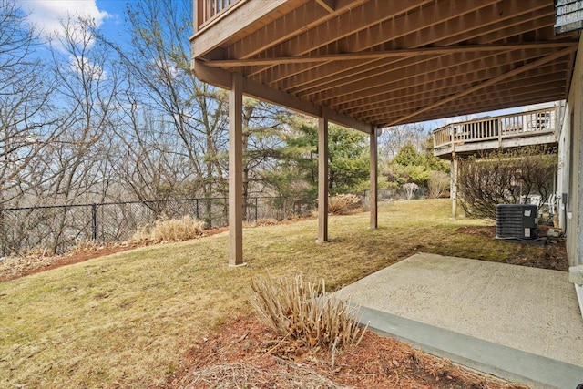 view of yard with a patio, cooling unit, and fence