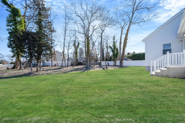 view of yard featuring fence