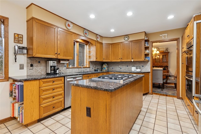 kitchen featuring a sink, a kitchen island, light tile patterned floors, stainless steel appliances, and open shelves