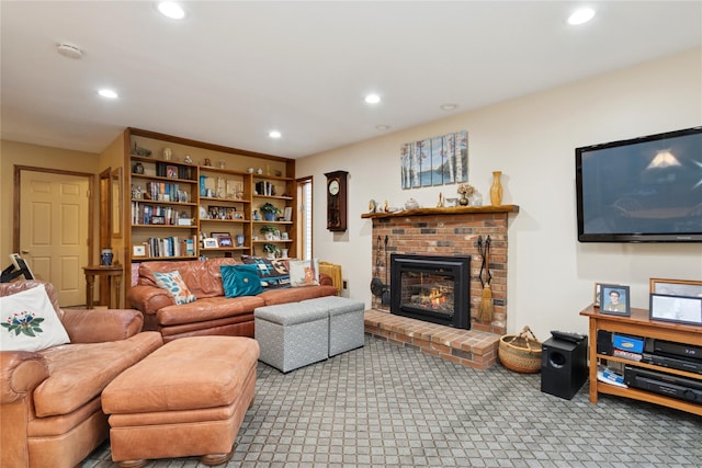 carpeted living area featuring recessed lighting and a fireplace