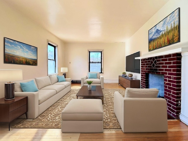 living area with wood finished floors and a wealth of natural light