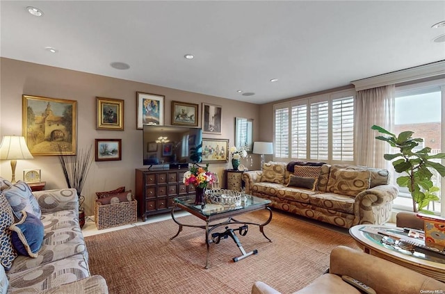 living room featuring recessed lighting