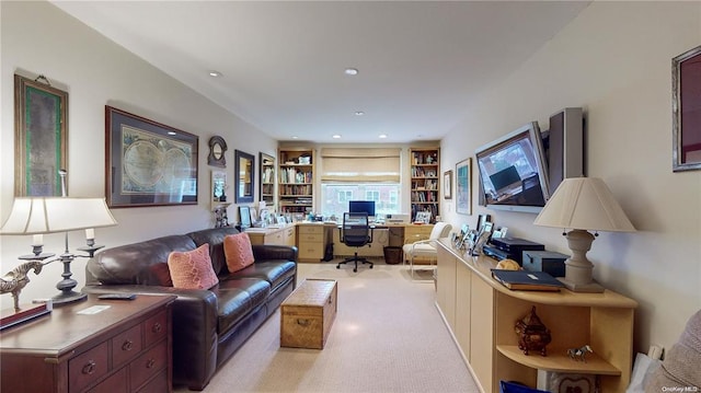 living room featuring recessed lighting and light colored carpet