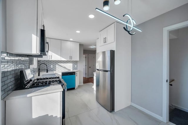 kitchen with tasteful backsplash, light countertops, appliances with stainless steel finishes, marble finish floor, and white cabinetry