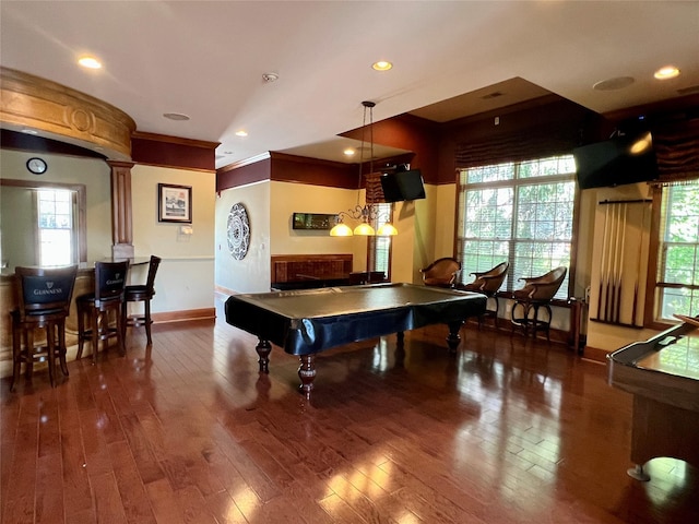 recreation room featuring plenty of natural light, pool table, baseboards, and hardwood / wood-style flooring