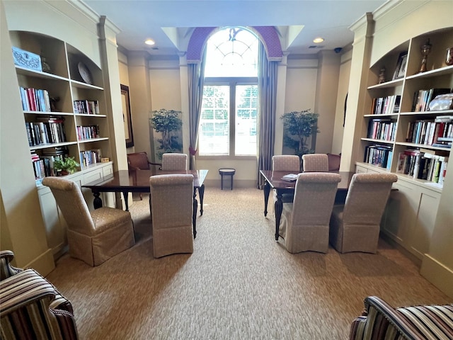 interior space featuring baseboards, built in features, ornamental molding, carpet flooring, and recessed lighting