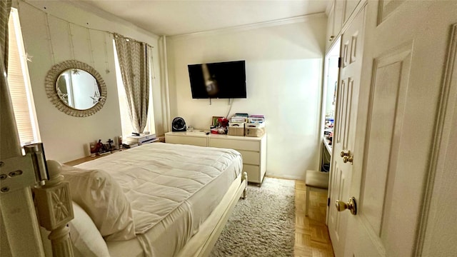 bedroom featuring ornamental molding