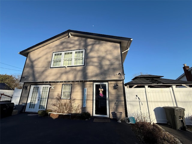 17 Hampton Rd, Shirley, NY 11967 - back of house with french doors and fence
