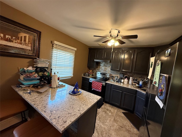 kitchen with ceiling fan, a peninsula, refrigerator with ice dispenser, electric range oven, and tasteful backsplash