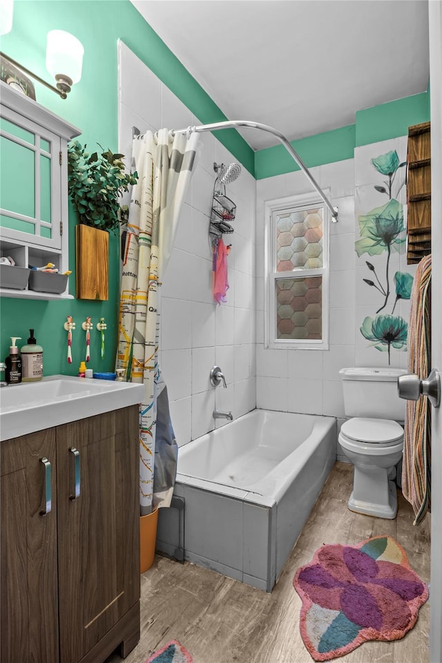 bathroom with shower / bath combination with curtain, vanity, and toilet