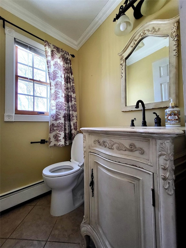 half bathroom with toilet, ornamental molding, tile patterned flooring, vanity, and a baseboard heating unit