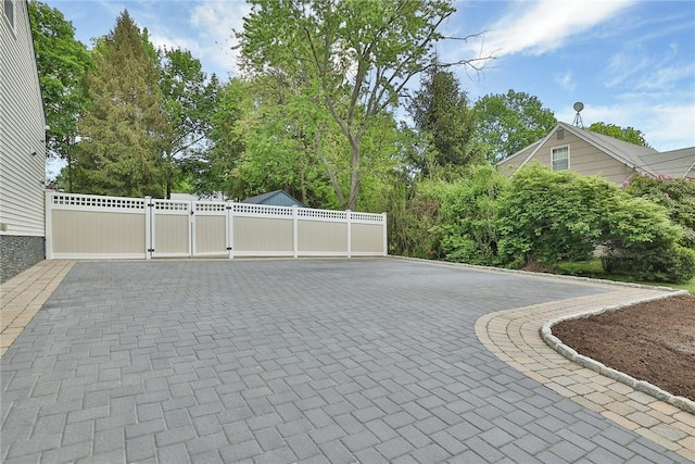 view of gate featuring fence