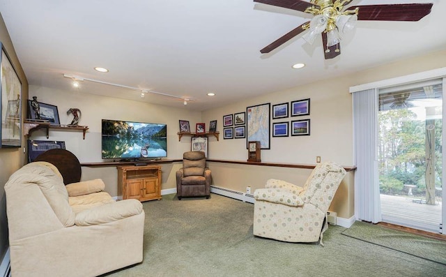 carpeted living room featuring baseboards, baseboard heating, and recessed lighting